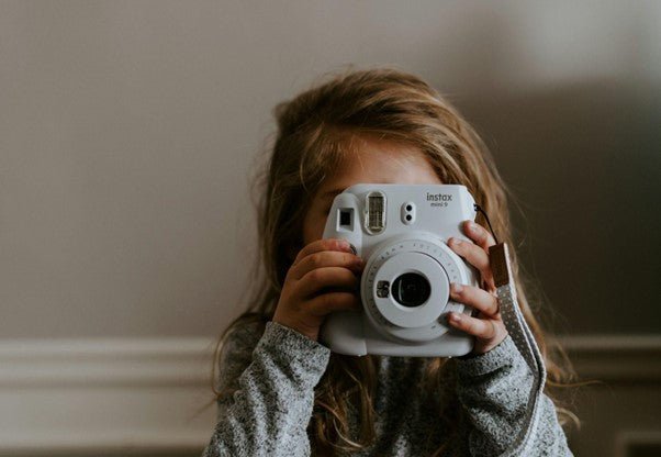 How to Make a Photo Album with Your Kid's Photos - Proactive Baby